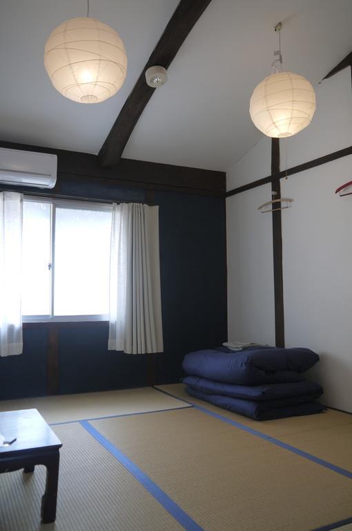 Minatoya Guesthouse Iki Habitación foto